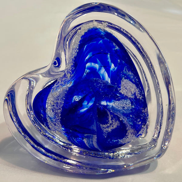 Cremation ashes into step heart paperweight