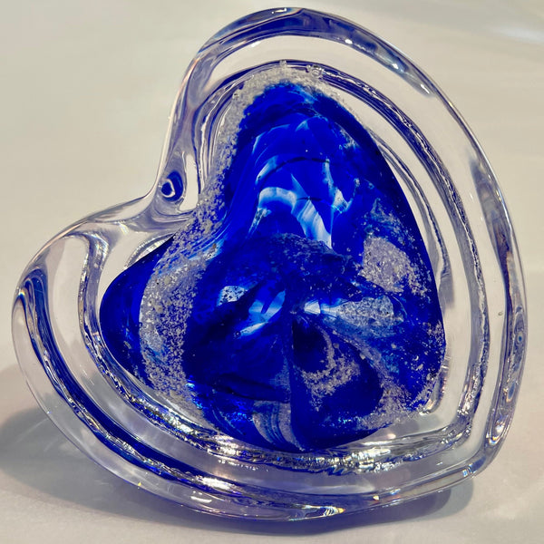 Cremation ashes into step heart paperweight